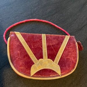 Art Deco red leather vintage bag with gold details.  Vintage!